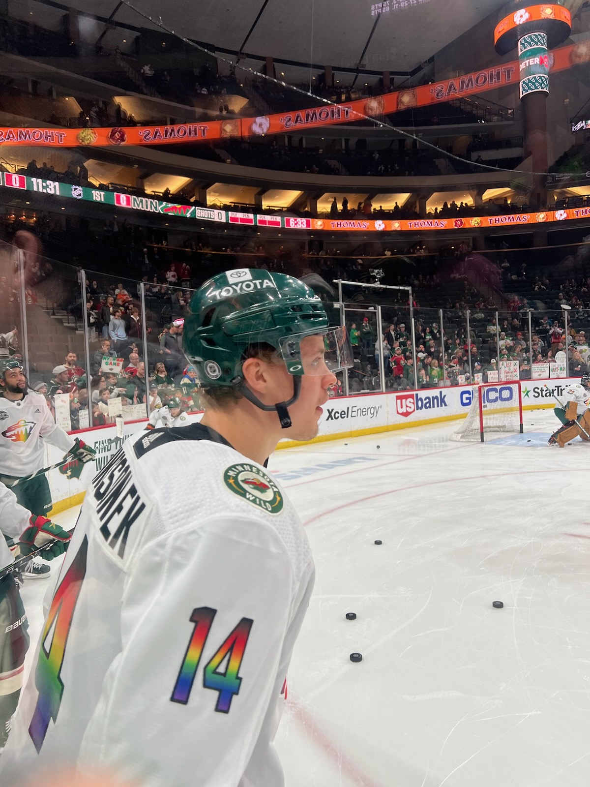 Picture of Joel Eriksson Ek skating on the ice by the glass during warmups